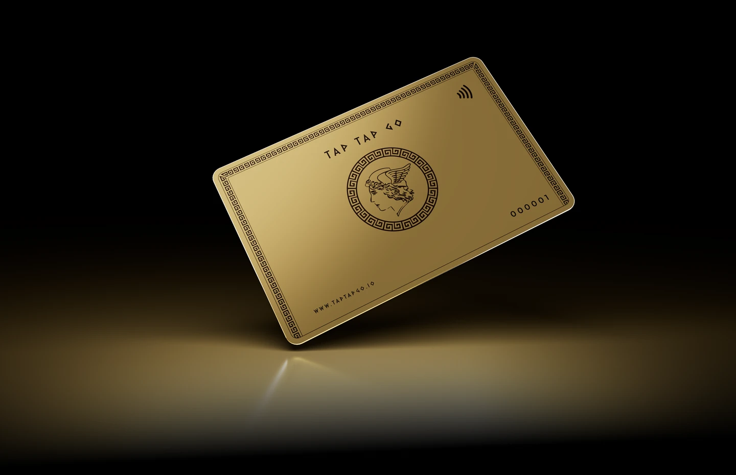 The Tap Tap Go Gold Card with its classic emblem, suspended over a reflective studio surface